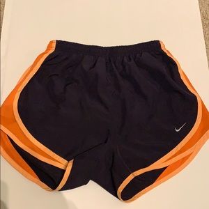 deep purple and orange nike shorts